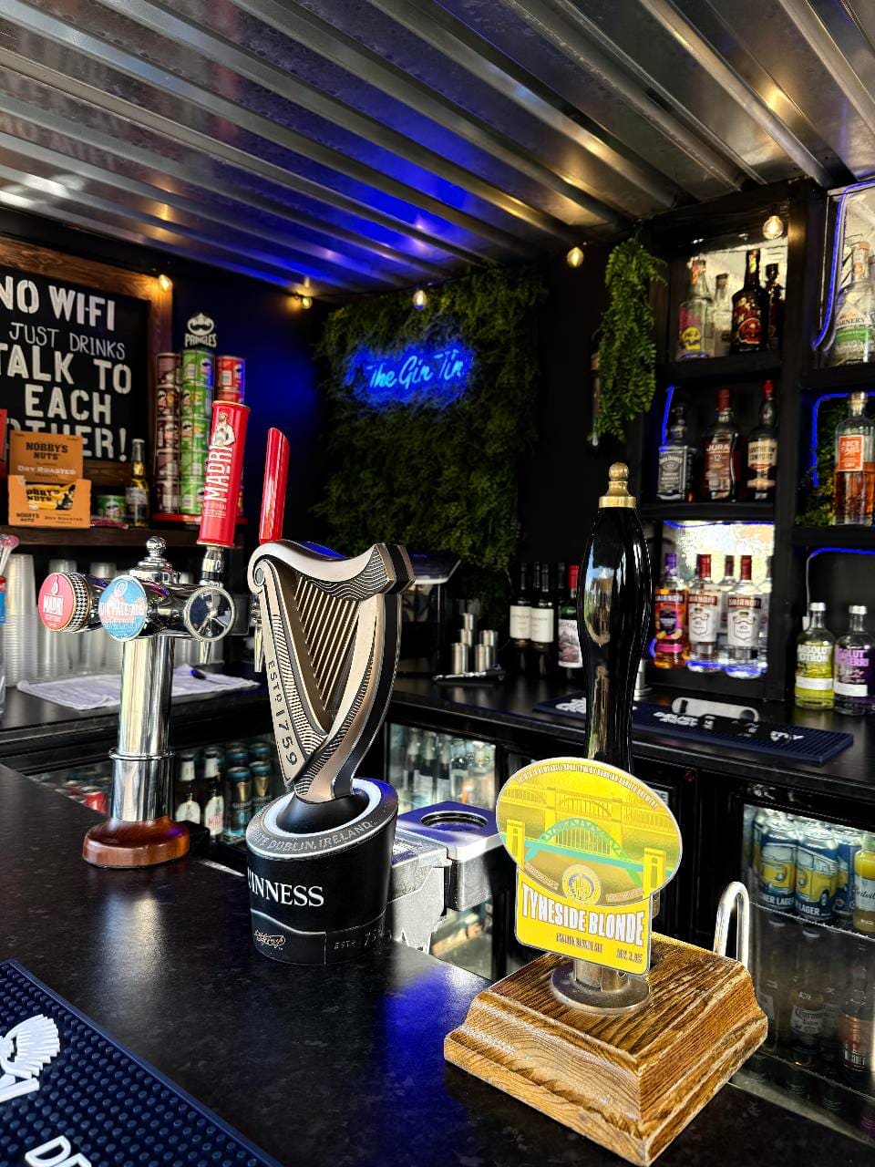 Inside The Gin Tin bar at Coast and Castles — Guinness, Tyneside Blonde on tap and a well-stocked back bar